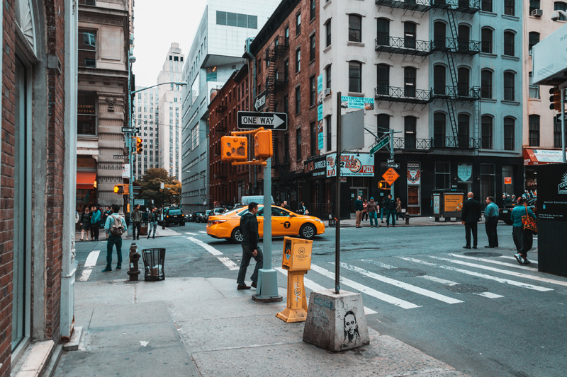 people crossing city street