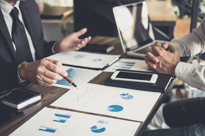 An investor talking to a client