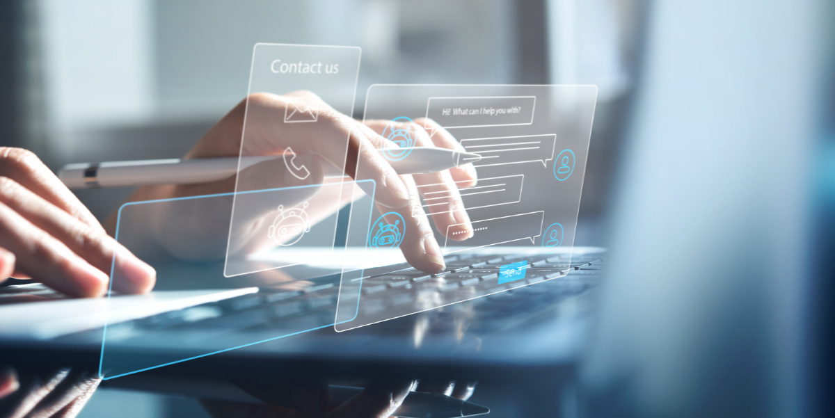 hand-typing-on-laptop-with-image-of-chat-support