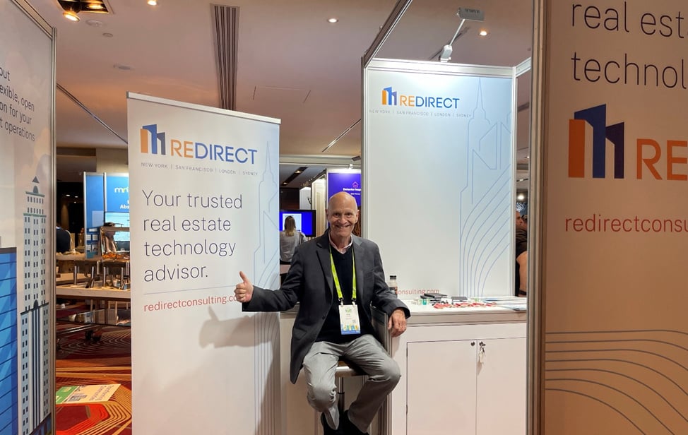 redirect-blog-october-ascend-conference-man-with-banner