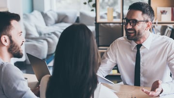 two clients meeting with an investor